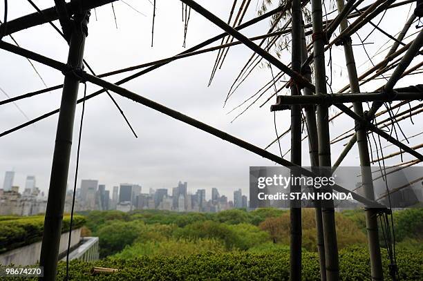 View over Central Park from US artists Doug and Mike Starn's sculpture "Big Bambú: You Can't, You Don't, and You Won't Stop", April 26 a large bamboo...