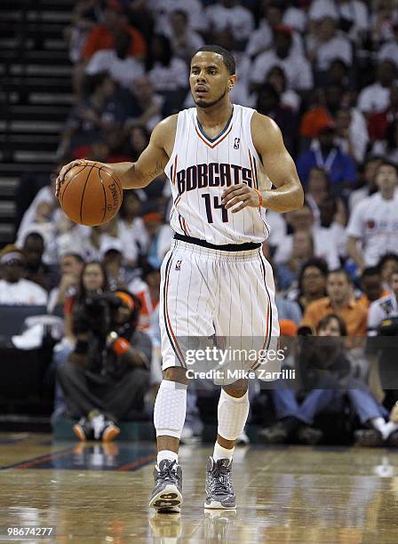 Guard D.J. Augustin of the Charlotte Bobcats dribbles the ball upcourt during Game Three of the Eastern Conference Quarterfinals against the Orlando...