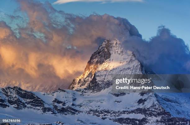 a snow-capped mountain. - peter snow stock pictures, royalty-free photos & images