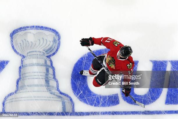 John Madden of the Chicago Blackhawks stretches before Game Two of the Western Conference Quarterfinals against the Nashville Predators during the...