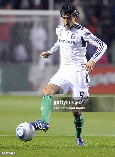 Baggio Husidic of the Chicago Fire brings the ball forward against the Houston Dynamo in an MLS match on April 24, 2010 at Toyota Park in Brideview,...