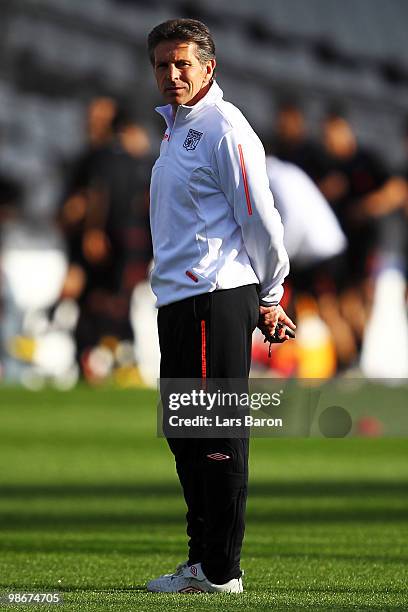 Head coach Claude Puel looks on during a Olympic Lyon training session at Stade de Gerland on April 26, 2010 in Lyon, France. Lyon will play against...