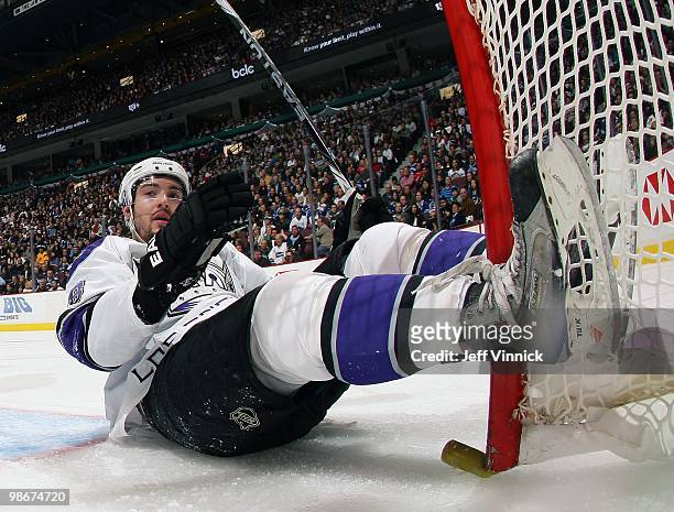 Drew Doughty of the Los Angeles Kings collides with the net in Game Five of the Western Conference Quarterfinals in their game against the Vancouver...