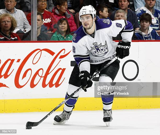 Drew Doughty of the Los Angeles Kings skates up ice with the puck in Game Five of the Western Conference Quarterfinals in their game against the...