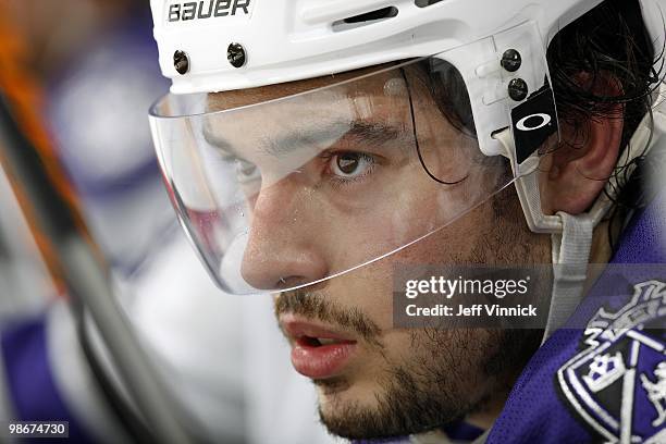 Drew Doughty of the Los Angeles Kings looks on from the bench in Game Five of the Western Conference Quarterfinals in their game against the...