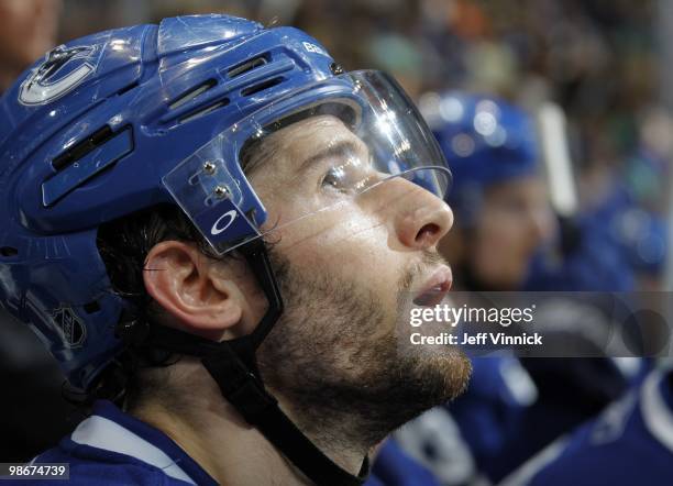 Ryan Kesler of the Vancouver Canucks looks on from the bench in Game Five of the Western Conference Quarterfinals in their game against the Los...