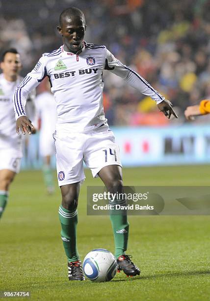 Patrick Nyarko of the Chicago Fire brings the ball forward against the Houston Dynamo in an MLS match on April 24, 2010 at Toyota Park in Brideview,...