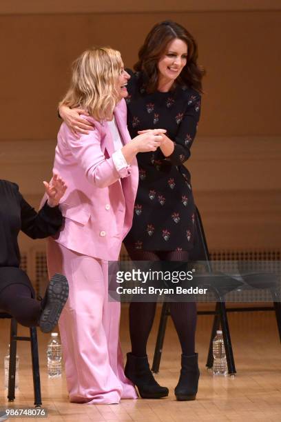Amy Poehler and Tina Fey perform onstage during ASSSSCAT with the Upright Citizens Brigade Live at Carnegie Hall celebrating the 20th Anniversary of...