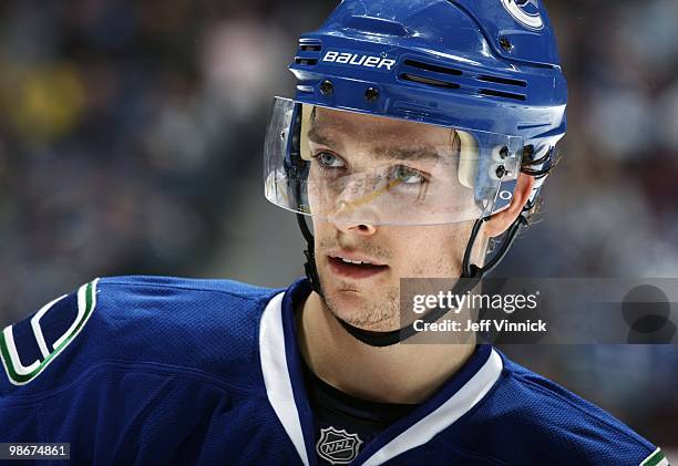 Mason Raymond of the Vancouver Canucks looks on from the bench in Game Five of the Western Conference Quarterfinals in their game against the Los...