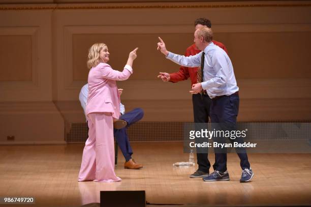 Amy Poehler and Matt Walsh perform onstage during ASSSSCAT with the Upright Citizens Brigade Live at Carnegie Hall celebrating the 20th Anniversary...