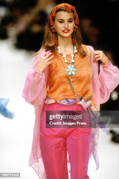 Niki Taylor models St. Laurent at Paris Fashion Week circa 1991 in Paris.