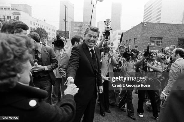 Presidential candidate Ronald Reagan shakes hands with a supporter in this 1976 Los Angeles, California, photo leading up to the Republican National...