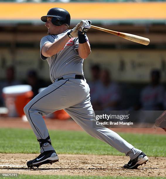 Mike Redmond of the Cleveland Indians bats against the Oakland Athletics during the game at Oakland-Alameda County Coliseum on April 24, 2010 in...