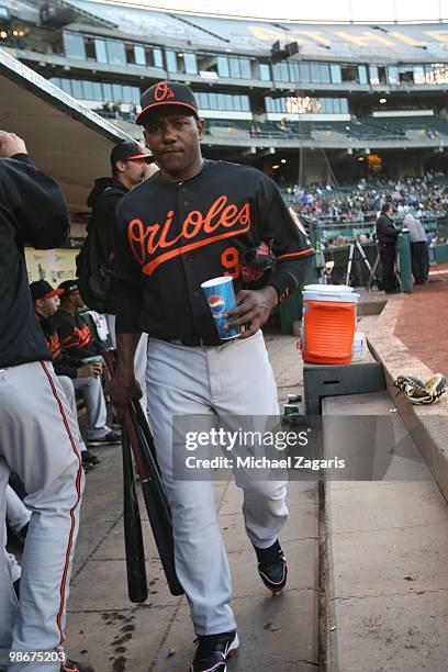 Miguel Tejada of the Baltimore Orioles standing in the dugout prior to the game against the Oakland Athletics at the Oakland Coliseum in Oakland,...