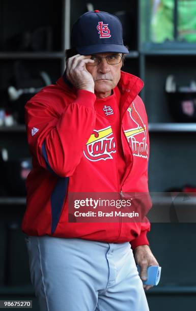 Manager Tony La Russa of the St. Louis Cardinals walks in the dugout during the game against the San Francisco Giants at AT&T Park on April 24, 2010...