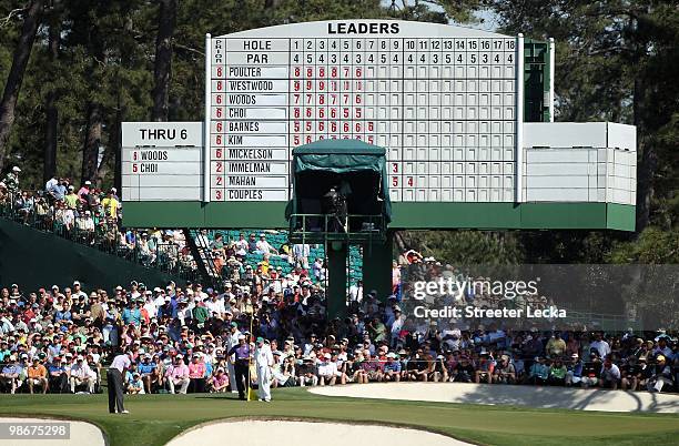 Tiger Woods K.J. Choi during the third round of the 2010 Masters Tournament at Augusta National Golf Club on April 10, 2010 in Augusta, Georgia.