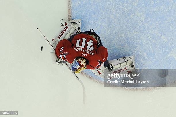 Semyon Varalmov of the Washington Capitals makes a save during a game against the Montreal Canadiens during Game Two of the Eastern Conference...