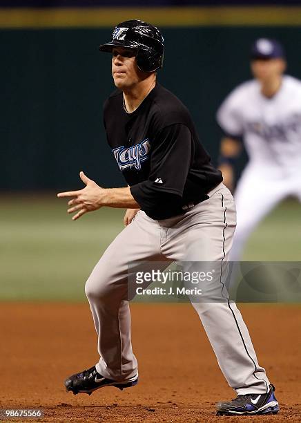 Infielder Aaron Hill of the Toronto Blue Jays takes a lead at first base against the Tampa Bay Rays during the game at Tropicana Field on April 23,...