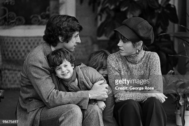 Academy Award-winning actress Jane Fonda sits on the veranda of her home with her husband, Tom Hayden, son Troy Garity, and daughter Vanessa Vadim ,...