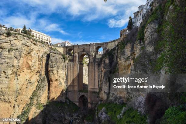 puente nuevo, ronda - espejo stock pictures, royalty-free photos & images