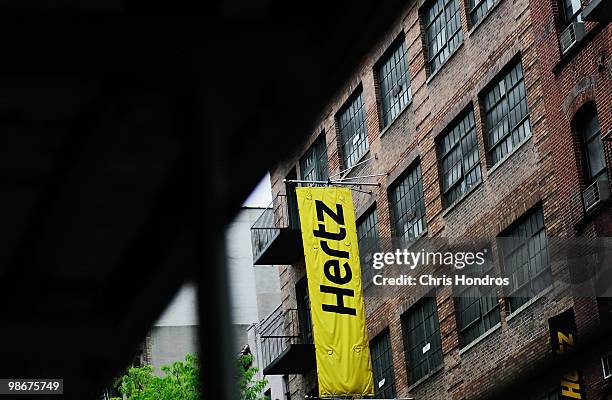 Sign is seen outside of a Hertz car rental location April 26, 2010 in New York City. Hertz Global Holdings Inc. Has announced that it will buy Dollar...