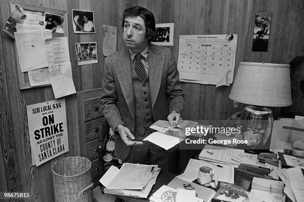 Former "Chicago Seven" defendant, social activist and California State Legislator, Tom Hayden, poses in his office during a 1976 Santa Monica,...