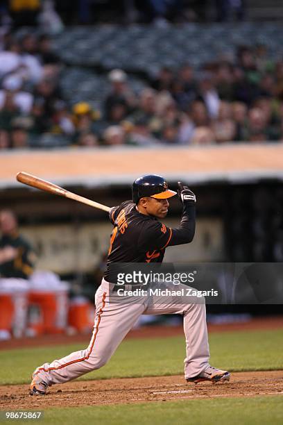 Cesar Izturis of the Baltimore Orioles hitting during the game against the Oakland Athletics at the Oakland Coliseum in Oakland, California on April...