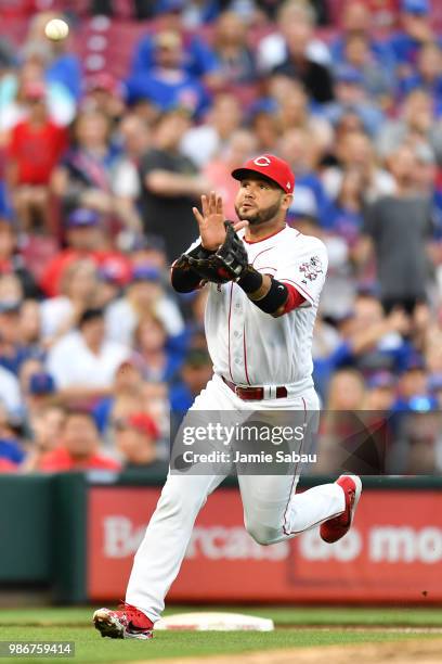 Eugenio Suarez of the Cincinnati Reds fields a ground ball against the Chicago Cubs at Great American Ball Park on June 22, 2018 in Cincinnati, Ohio.