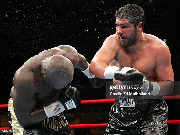 Champion John "The Quietman" Ruiz and challenger James "Lights Out" Toney trade punches during their WBA Heavyweight fight at Madison Square Garden....