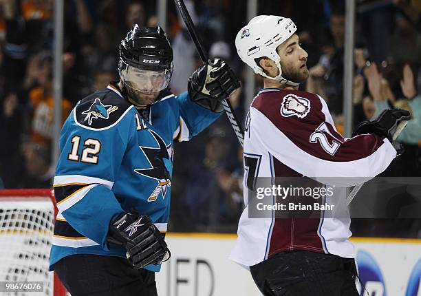 Patrick Marleau of the San Jose Sharks celebrates a goal against Kyle Quincey and the Colorado Avalanche in Game Five of their Western Conference...