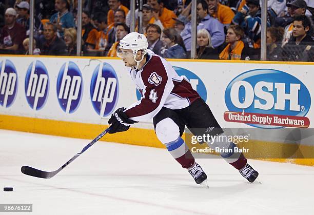 John-Michael Liles of the Colorado Avalanche takes the puck out of the defensive zone against the San Jose Sharks in Game Five of their Western...