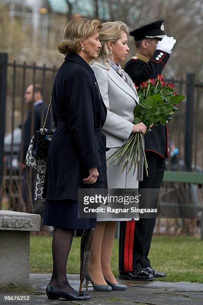Queen Sonja of Norway and Svetlana Medvedeva, wife of Russian president Dmitry Medvedev, visit the Soviet memorial at the Western Cemetery to...