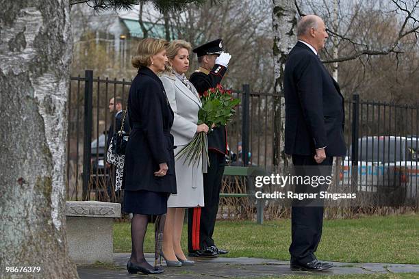 Queen Sonja of Norway, Svetlana Medvedeva and King Harald V of Norway visit the Soviet memorial at the Western Cemetery to remember Soviet troops who...