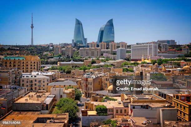 baku old town with flame towers in the background, azerbaijan - baku stock pictures, royalty-free photos & images