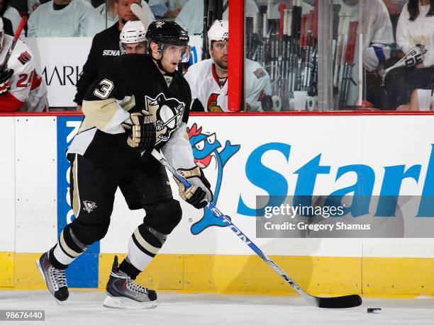 Alex Goligoski of the Pittsburgh Penguins moves the puck up ice against the Ottawa Senators in Game Five of the Eastern Conference Quaterfinals...