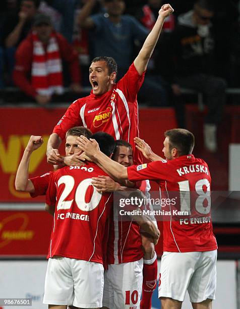 Nils Petersen of Cottbus jubilates with team mates after scoring the first goal during the Second Bundesliga match between FC Energie Cottbus and...