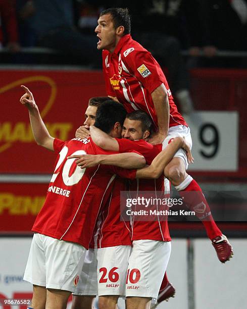 Nils Petersen of Cottbus jubilates with team mates after scoring the first goal during the Second Bundesliga match between FC Energie Cottbus and...