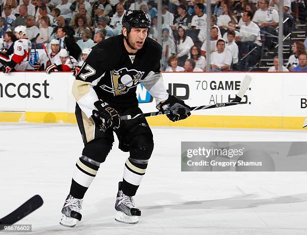 Mike Rupp of the Pittsburgh Penguins skates up ice against the Ottawa Senators in Game Five of the Eastern Conference Quaterfinals during the 2010...