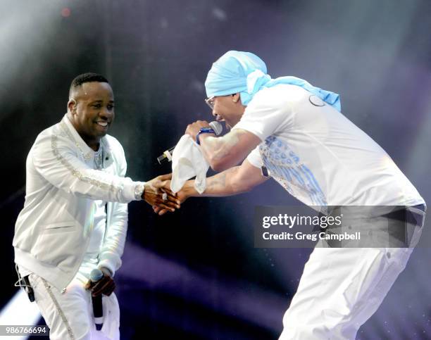 Yo Gotti and Juvenile perform onstage during the 6th Yo Gotti Birthday Bash at FedExForum on June 28, 2018 in Memphis, Tennessee.