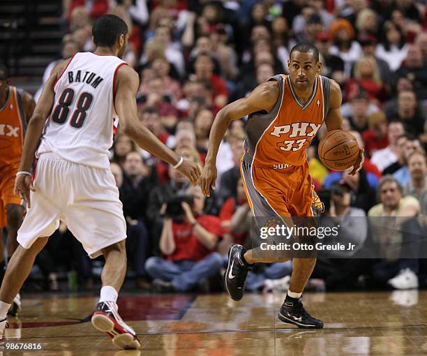 Grant Hill of the Phoenix Suns drives against Nicolas Batum of the Portland Trail Blazers during Game Four of the Western Conference Quarterfinals of...