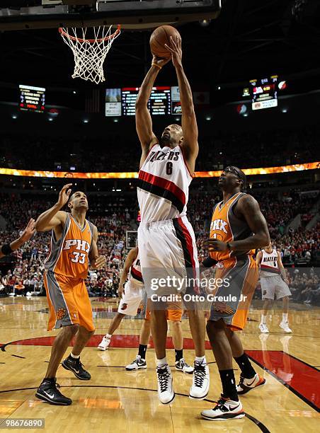 Juwan Howard of the Portland Trail Blazers shoots against the Phoenix Suns during Game Four of the Western Conference Quarterfinals of the NBA...