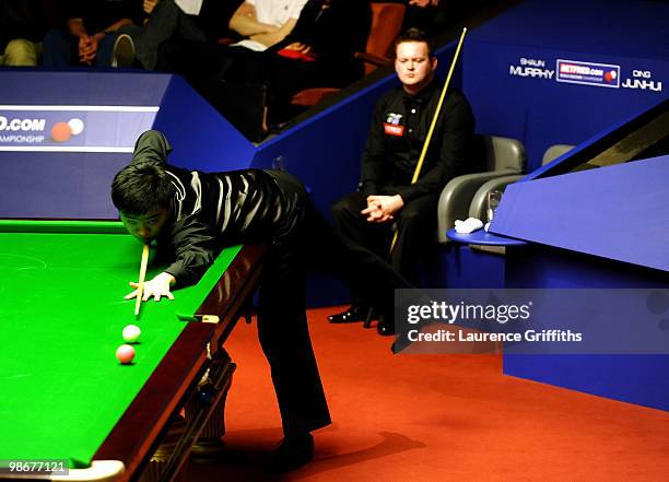 Ding Junhui of China in action in his match against Shaun Murphy of England during the Betfred.com World Snooker Championships at the Crucible...