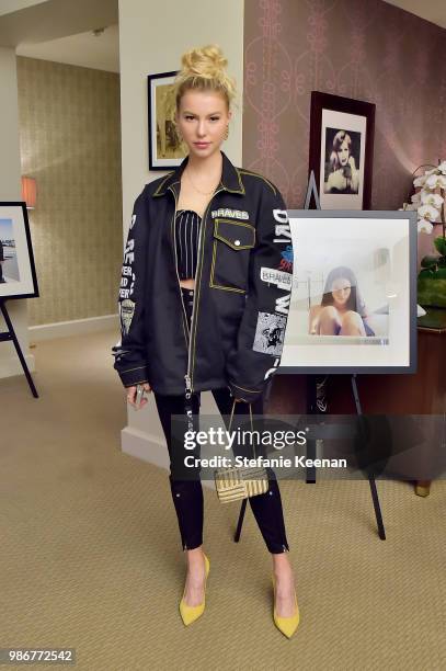 Lexi Atkins attends Diesel Presents Scott Lipps Photography Exhibition 'Rocks Not Dead' at Sunset Tower on June 28, 2018 in Los Angeles, California.