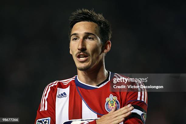 Sacha Kljestan of Chivas USA asks the referee's assistant for a clarification on a call during their MLS match against the San Jose Earthquakes at...