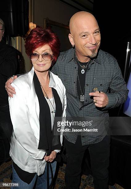 Judges Howie Mandel and Sharon Osbourne talk with reporters at the NBC Universal Summer Press Day on April 26, 2010 in Pasadena, California.