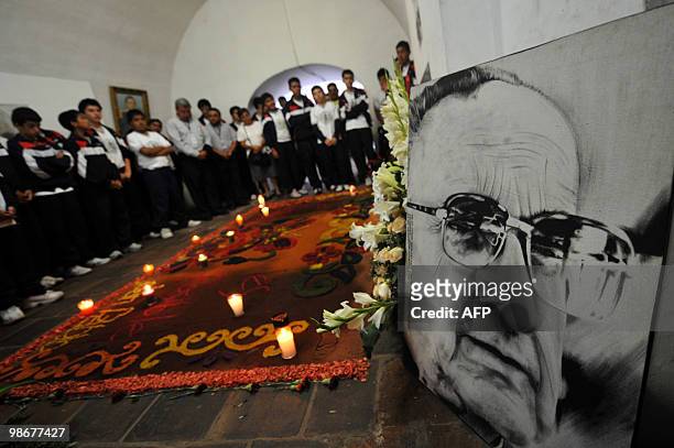 Students visit the crypt where Monsignor Juan Jose Gerardi is buried in Guatemala's Metropolitan Cathedral on April 26, 2010 in Guatemala City....