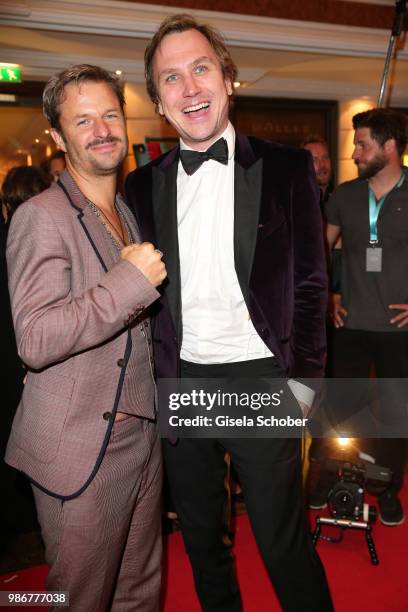 Philipp Hochmair and Lars Eidinger during the opening night of the Munich Film Festival 2018 reception at Hotel Bayerischer Hof on June 28, 2018 in...