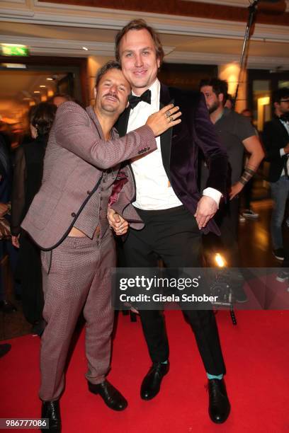 Philipp Hochmair and Lars Eidinger during the opening night of the Munich Film Festival 2018 reception at Hotel Bayerischer Hof on June 28, 2018 in...