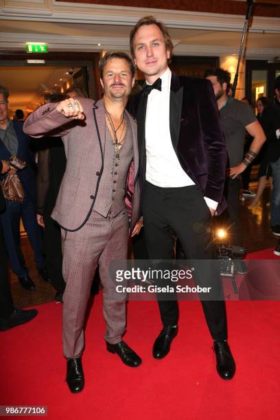 Philipp Hochmair and Lars Eidinger during the opening night of the Munich Film Festival 2018 reception at Hotel Bayerischer Hof on June 28, 2018 in...