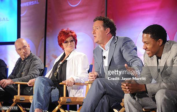Judge Howie Mandel, judge Sharon Osbourne, judge Piers Morgan, and host Nick Canon talk with reporters at the NBC Universal Summer Press Day on April...